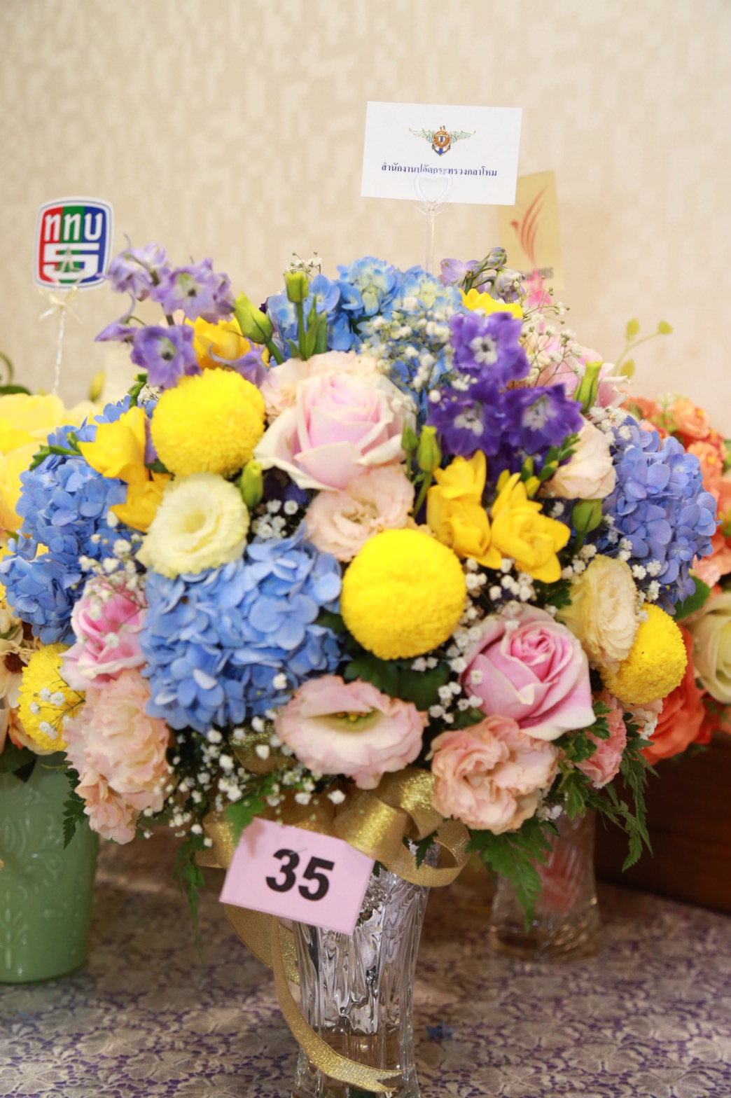 122 พล.อ.ปรีชา จันทร์โอชา ปลัดกระทรวงกลาโหม คุณผ่องพรรณ จันทร์โอชา นายกสมาคมภริยาฯ นำ คณะนายทหารขั้นผู้ใหญ่และภริยา ร่วมทูลเกล้าฯถวายแจกันดอกไม้ และลงนามถวายพระพร แด่สมเด็จพระบรมโอรสาธิราช เจ้าฟ้ามหาวชิราลงกรณ สยามมกุฎราชกุมาร เนื่องในโอกาสวันคล้ายวันพระราชสมภพ